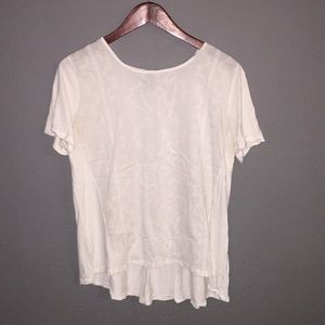 Eyelet shirt with flowy back